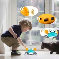 Interactive crab performing the function silencing LED sound educational toy with motion and light