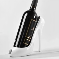Wine stand in shape of a high-heeled white decorative bottle holder