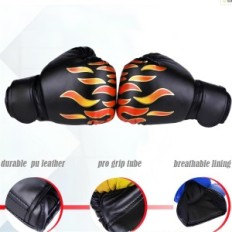 Boxing gloves for children. Black Durable training gloves for young athletes