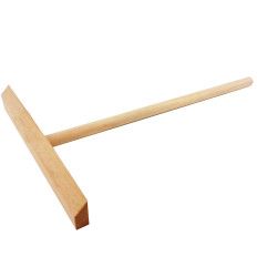 Een spatel voor het distribueren van deeg voor pannenkoeken