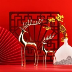 Golden figures of the reindeer of Surim elegant sculptures, a set of 2 pcs.