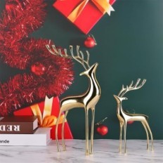 Golden figures of the reindeer of Surim elegant sculptures, a set of 2 pcs.